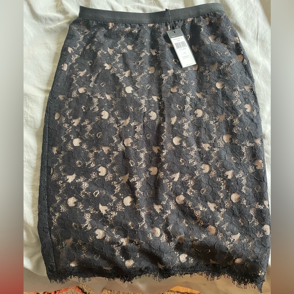 BCBG Black lace skirt size small would fit a size 6 great
